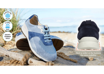 A pair of trainers on a beach