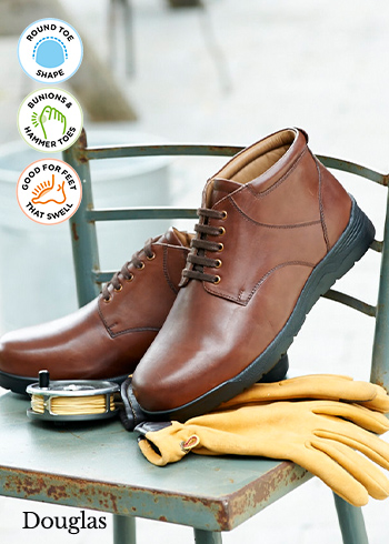 A pair of men's brown boots on a chair