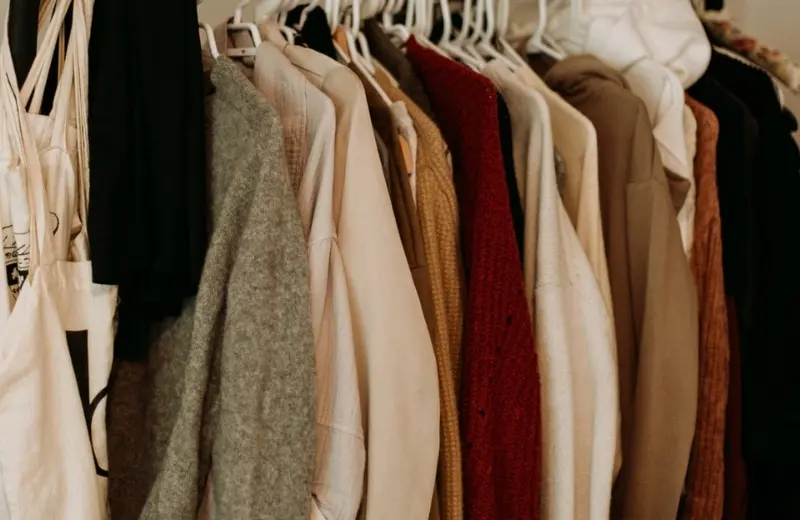A clothes rail full of clothing