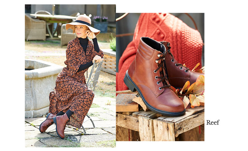 A woman sat wearing brown boots