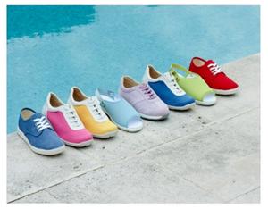 A selection of canvas shoes in a row