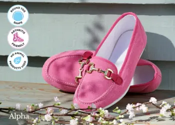 A pair of pink slip on canvas shoes