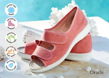 A pair of pink strapped sandals by a pool