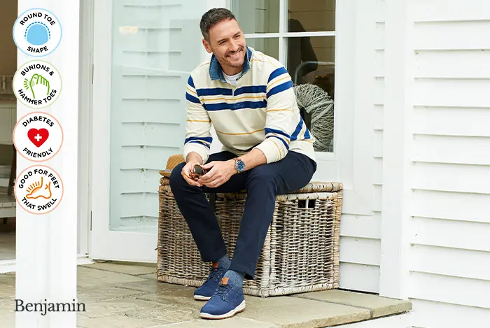 A man sat down on a bench