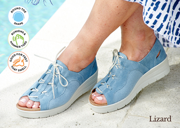 A woman wearing blue lace sandals