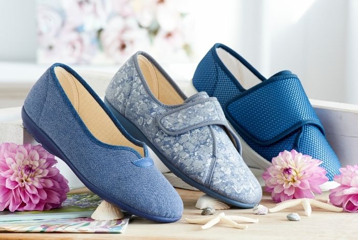 A trio of different types of slippers on a table