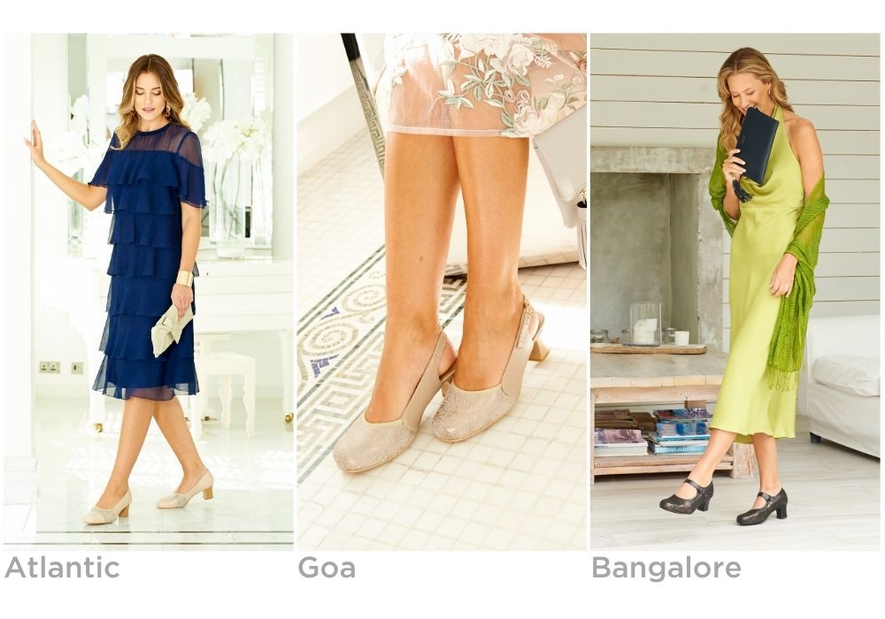 A trio of women indoors dressed up in elegant clothing