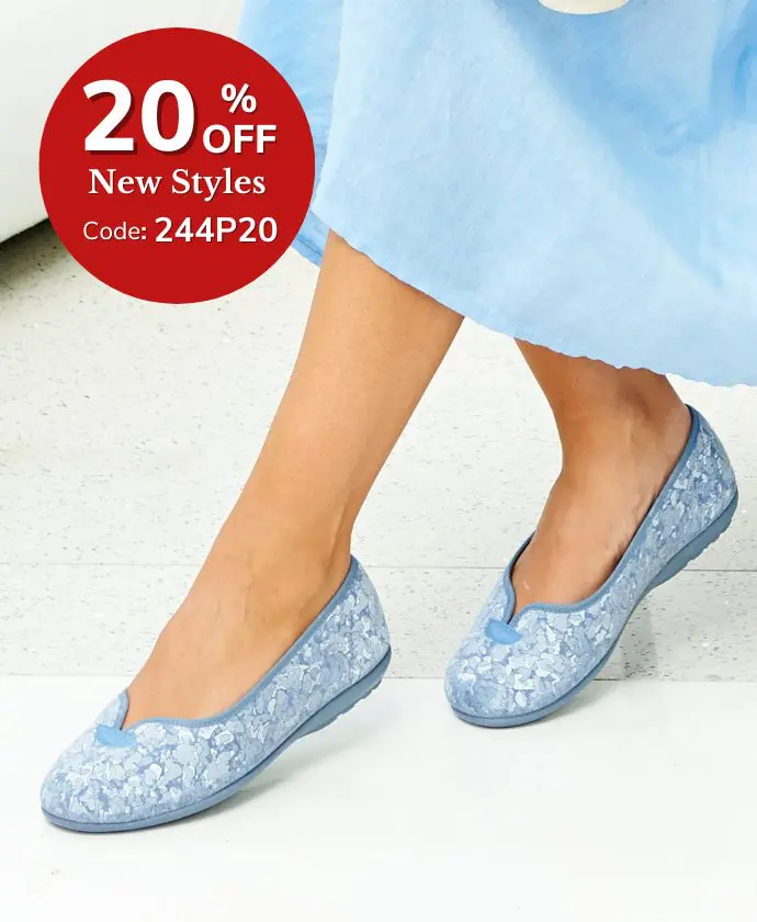 A woman wearing a pair of blue slippers