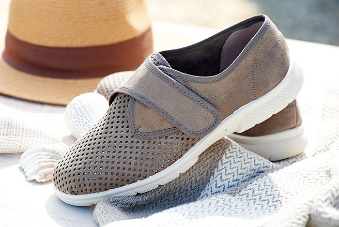 A pair of grey strap house shoes