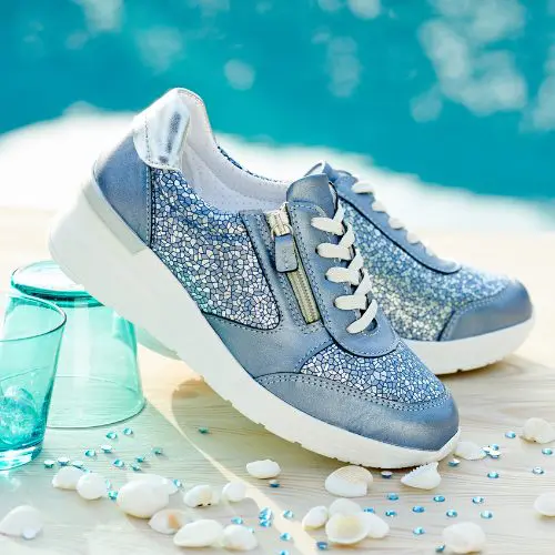 A pair of blue zip and lace trainers