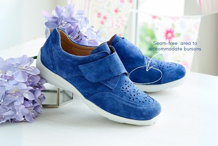 A pair of blue strap shoes on a table